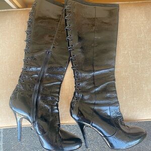 Sexy patent/pvc leather, lace-up in back; gently used boots